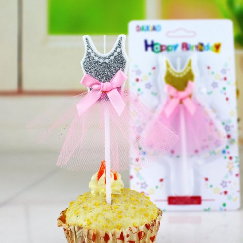 A cupcake or cake ballerina candle shaped as the dress with tutu