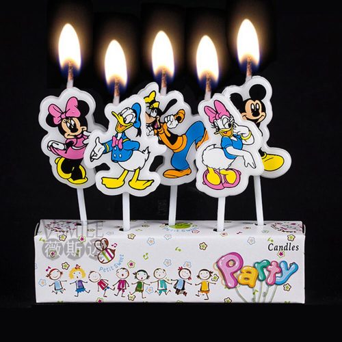 Picture of five Disney candles, lit.