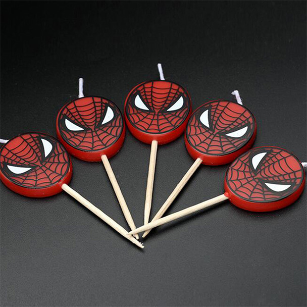A picture of 5 Spider-man man birthday candles