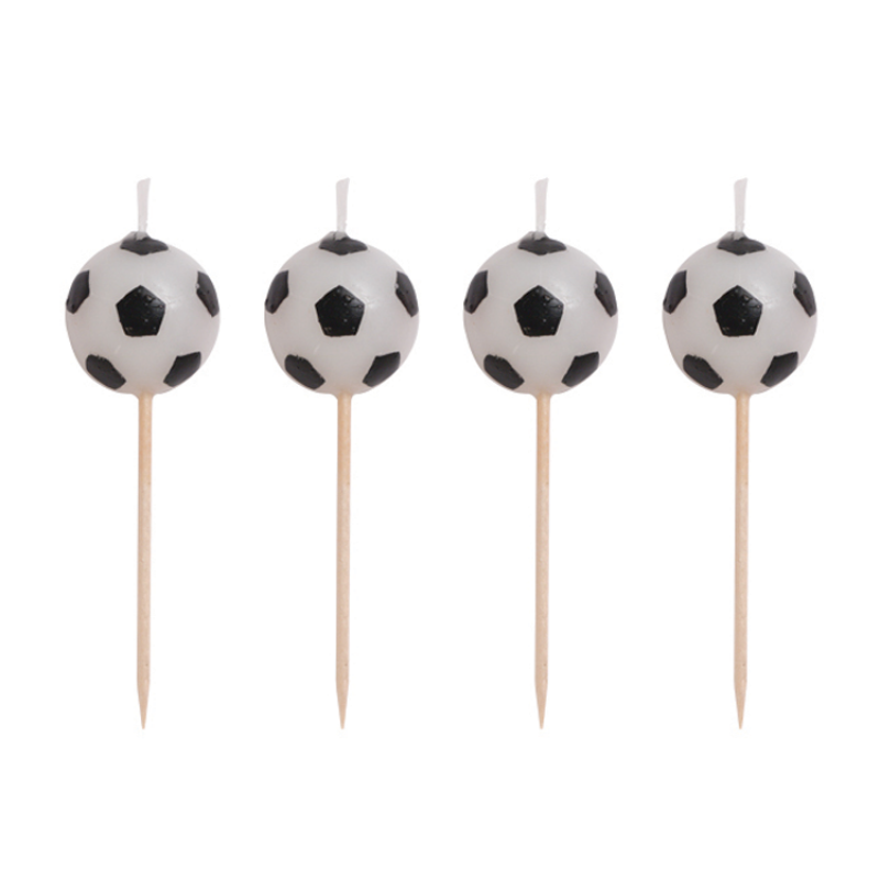 Photo of four individual candles which feature a football.